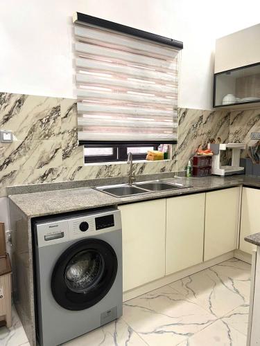 Kuchyň nebo kuchyňský kout v ubytování Luxury Duplex