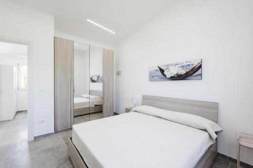 Postel nebo postele na pokoji v ubytování Villa Carancino