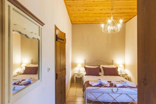 Ένα ή περισσότερα κρεβάτια σε δωμάτιο στο Villa Christini