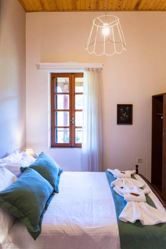 Ένα ή περισσότερα κρεβάτια σε δωμάτιο στο Villa Christini