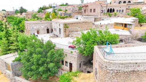an overhead view of an old city with buildings at Kapadokya Ihlara Konakları Otel Konak Odaları in Guzelyurt