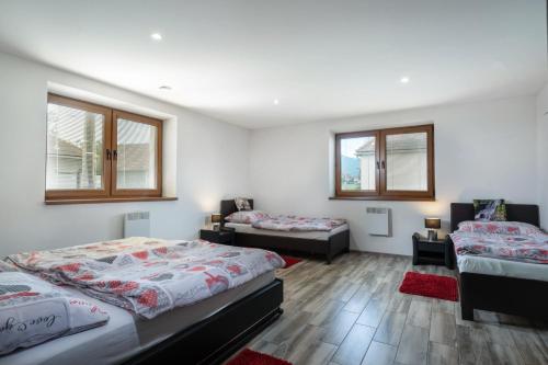 Postel nebo postele na pokoji v ubytování Apartmány Danka