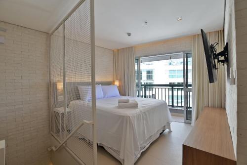 Voodi või voodid majutusasutuse Cobertura Duplex Luxuosa no Hotel Fusion toas