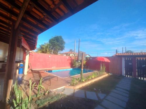 Afbeelding uit fotogalerij van Sinuca, churrasqueira e fogueira a 300 metros do mar in Itanhaém