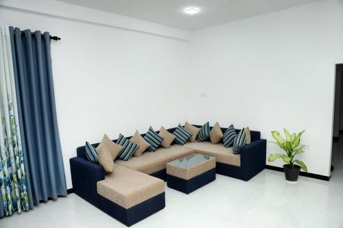 Χώρος καθιστικού στο Sandakini Home Rest