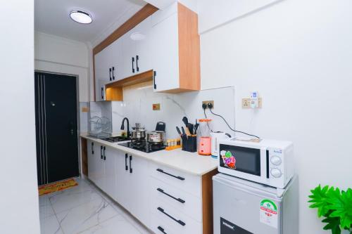 Η κουζίνα ή μικρή κουζίνα στο Smart Homes Apartment