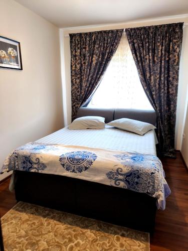 Llit o llits en una habitació de Sarah Apartament