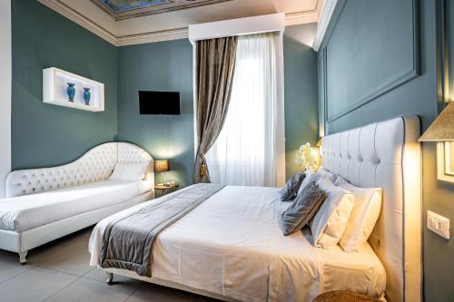 Letto o letti in una camera di Boutique Hotel La Casa di Morfeo