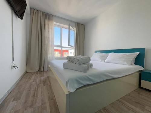 Katil atau katil-katil dalam bilik di Brasov Altipiani Apartments