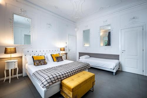 Letto o letti in una camera di Boutique Hotel La Casa di Morfeo
