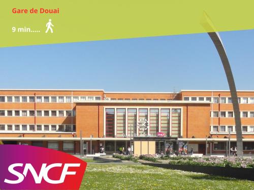 a school building with a sap sign in front of it at Petit cocon à Douai avec jardin et Netflix in Douai