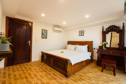 Ένα ή περισσότερα κρεβάτια σε δωμάτιο στο Stay Siem Reap