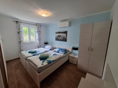 Ένα ή περισσότερα κρεβάτια σε δωμάτιο στο Villa Marion