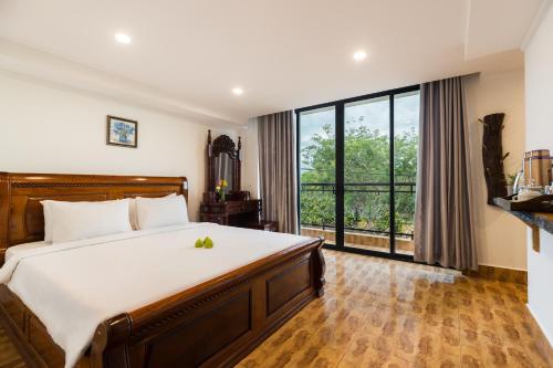 Ένα ή περισσότερα κρεβάτια σε δωμάτιο στο Stay Siem Reap