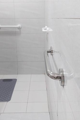 a bathroom with a glass sink in a shower at Casa G Private BeachfrontYour own private beach in Samal