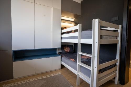 Μία ή περισσότερες κουκέτες σε δωμάτιο στο Apartment Onyx