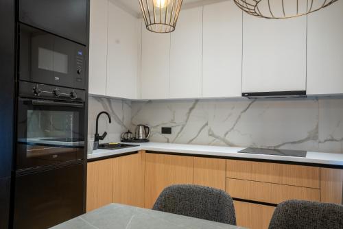 Η κουζίνα ή μικρή κουζίνα στο Apartment Onyx