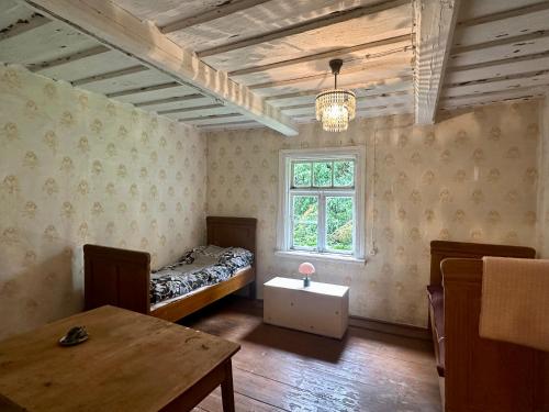 Ένα ή περισσότερα κρεβάτια σε δωμάτιο στο Retreat House