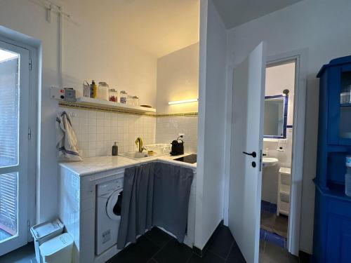 A kitchen or kitchenette at Casa Luvi