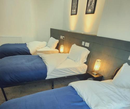 Cama ou camas em um quarto em Kop View