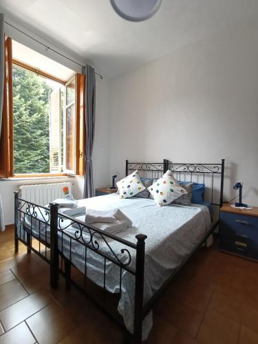 a bedroom with a bed and a window at AL40 - Turin Holiday Apartment in Turin