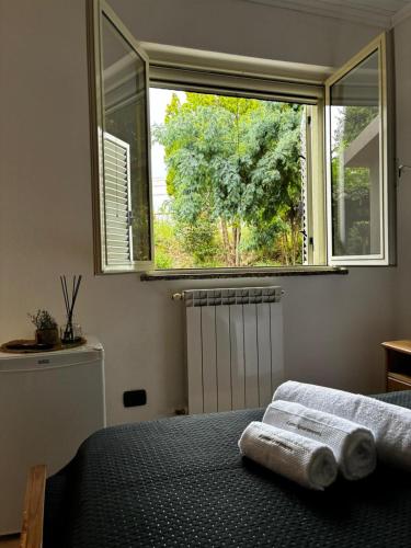Ένα ή περισσότερα κρεβάτια σε δωμάτιο στο FatimApartments
