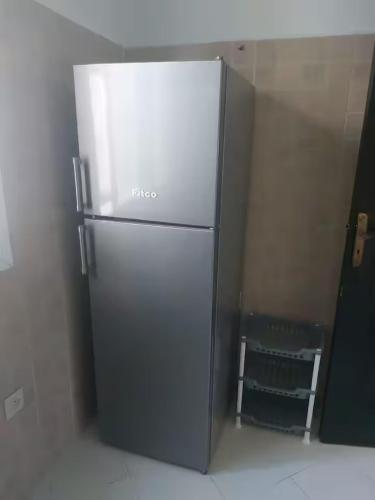 a stainless steel refrigerator in a room at Entire rental unit in Tangier, Morocco in Tangier