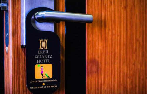Ein Zertifikat, Auszeichnung, Logo oder anderes Dokument, das in der Unterkunft Erbil Quartz Hotel ausgestellt ist