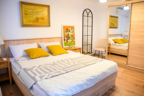 Postel nebo postele na pokoji v ubytování Pipera Studio Apartment