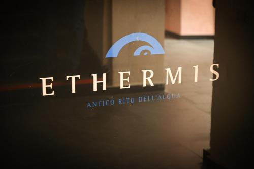 a sign that says elkenis andino rubino delleida at Hotel Terme Neronensis in Pozzuoli