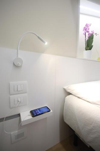 Letto o letti in una camera di Photomusic Boutique Rooms