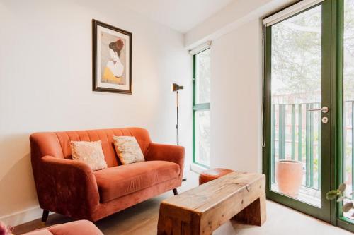 a living room with a couch and a coffee table at Upscale 2BR Gym & Bright View in Barranco in Lima