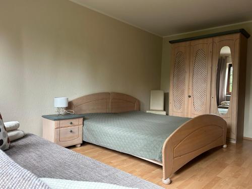 Postel nebo postele na pokoji v ubytování Ferienwohnung Waldschlößchen