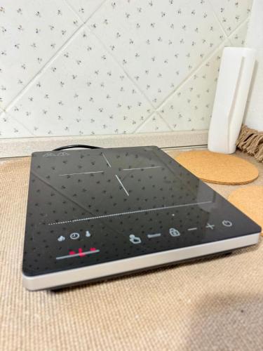 a laptop computer sitting on top of a table at Vila Kralj in Podčetrtek
