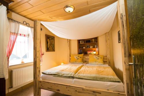 Postel nebo postele na pokoji v ubytování Haus Ella