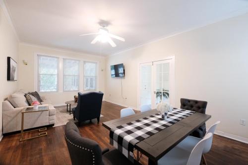 a living room with a table and a couch at 438M- 3 BR Apt with Free Parking on Premises and Coffee in San Antonio