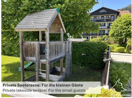 Κήπος έξω από το Seeblick Apartment am Walchensee
