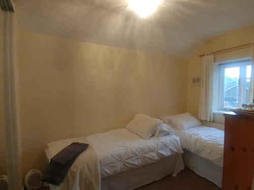 Ένα ή περισσότερα κρεβάτια σε δωμάτιο στο Private 2F Room - Shared Use of House
