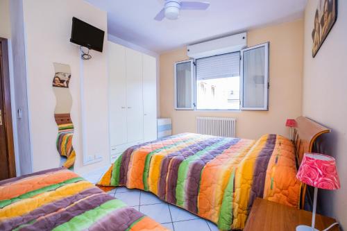 En eller flere senge i et værelse på 17 Primo Piano