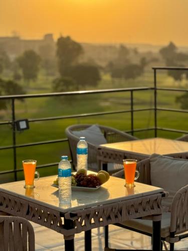 Balkón nebo terasa v ubytování Golden Golf Pyramids Hotel