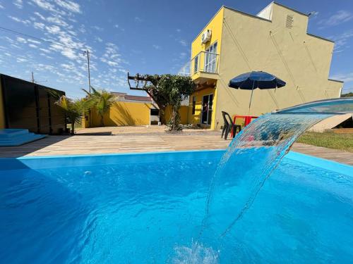 Kolam renang di atau dekat dengan Casa Temporada Aconchego e tranquilidade 2