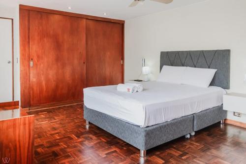 Cama o camas de una habitación en Elegant 3BR Tranquil Vibe in San Isidro
