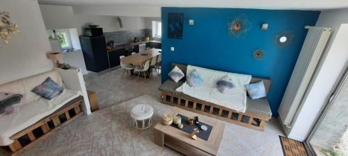 an overhead view of a room with a bed and a table at Chambre CHARDON - Maison partagée - 2 personnes in Saint-Sauvant