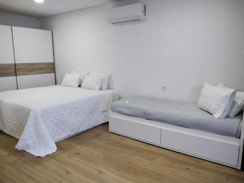 Ένα ή περισσότερα κρεβάτια σε δωμάτιο στο Green House