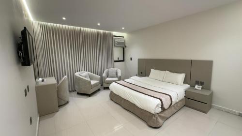 Llit o llits en una habitació de طارق الطائف