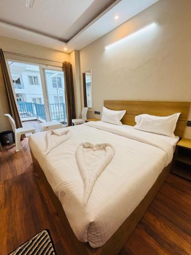 Postel nebo postele na pokoji v ubytování Hotel Abline the Oaks