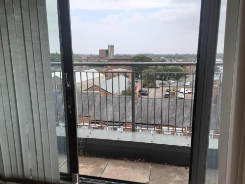 a view of a city from a balcony at Elegant three bedroom apartment in Darlington