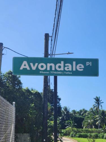a green street sign for avondale street at Avondale Place in Nuku‘alofa