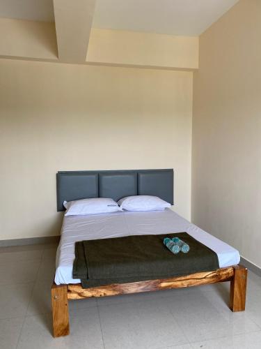 Katil atau katil-katil dalam bilik di Suvarna RR residency