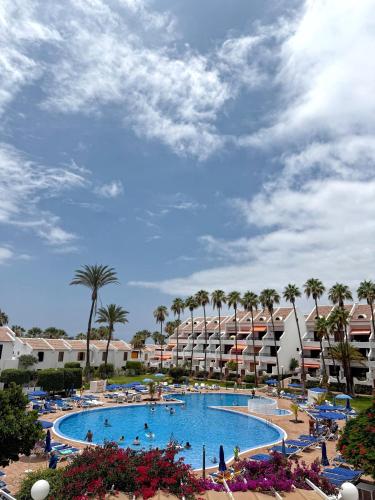 Parque Santiago II - modern studio Las Americas - heated pool, 250m to the beach